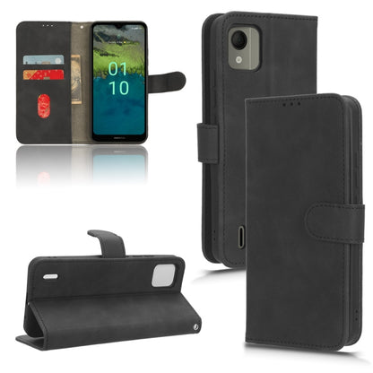 Black magnetic flip leather phone case with folio front and button cutout
