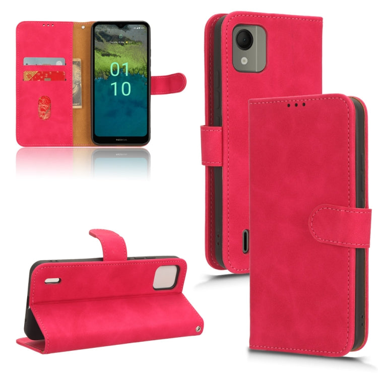 Red magnetic flip leather phone case with card slots and stand feature