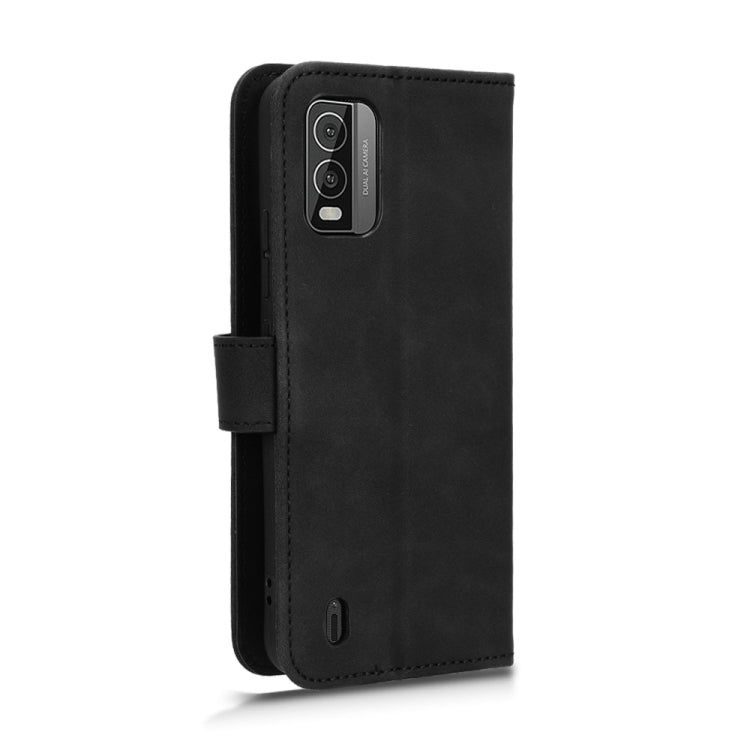 Black magnetic flip leather phone case with camera cutout and side strap