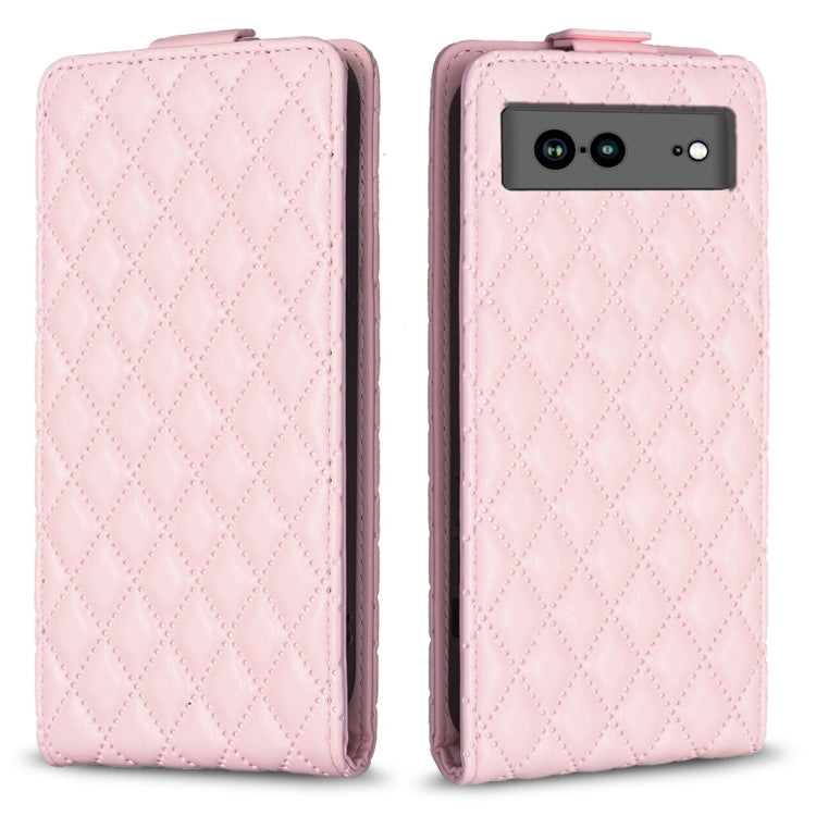 Pink leather flip phone case with diamond lattice texture and camera cutout