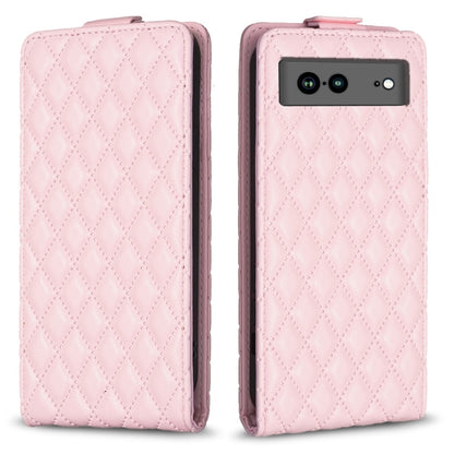 Pink leather flip phone case with diamond lattice texture and camera cutout