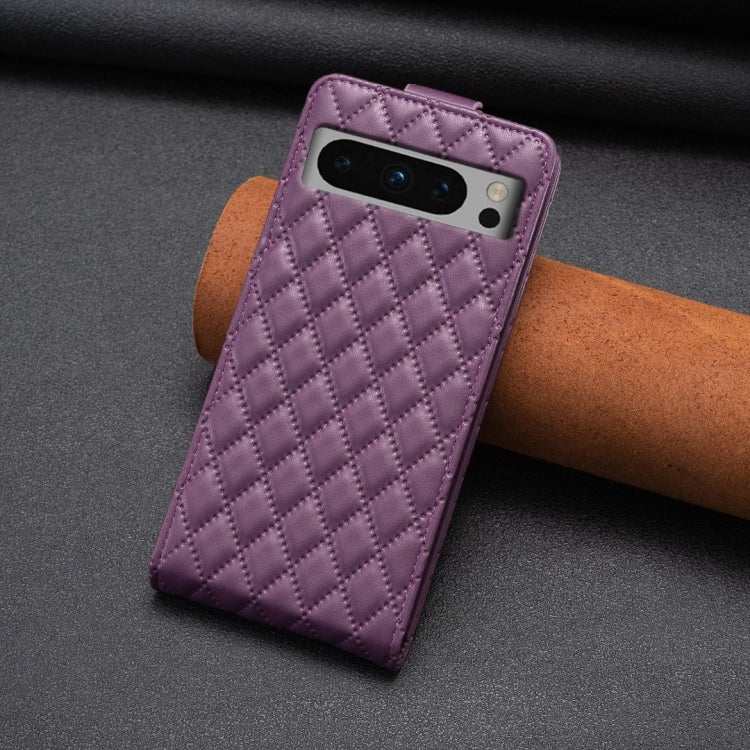 Purple diamond lattice leather flip phone case with camera cutout visible