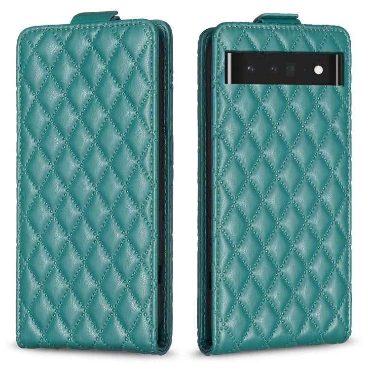 Teal leather flip phone case with diamond lattice texture and camera cutout