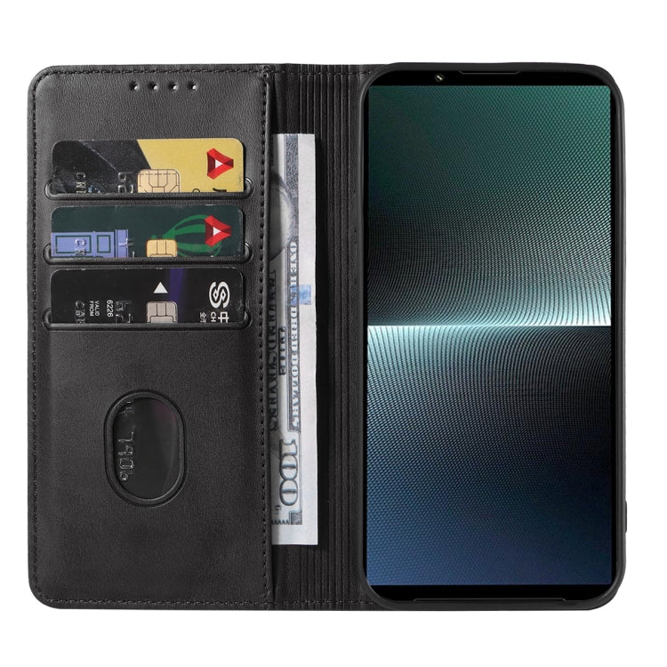 Black leather flip phone case with interior card holder and camera cutout.