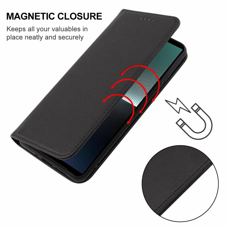 Black leather magnetic closure phone case with fold-over strap illustration.