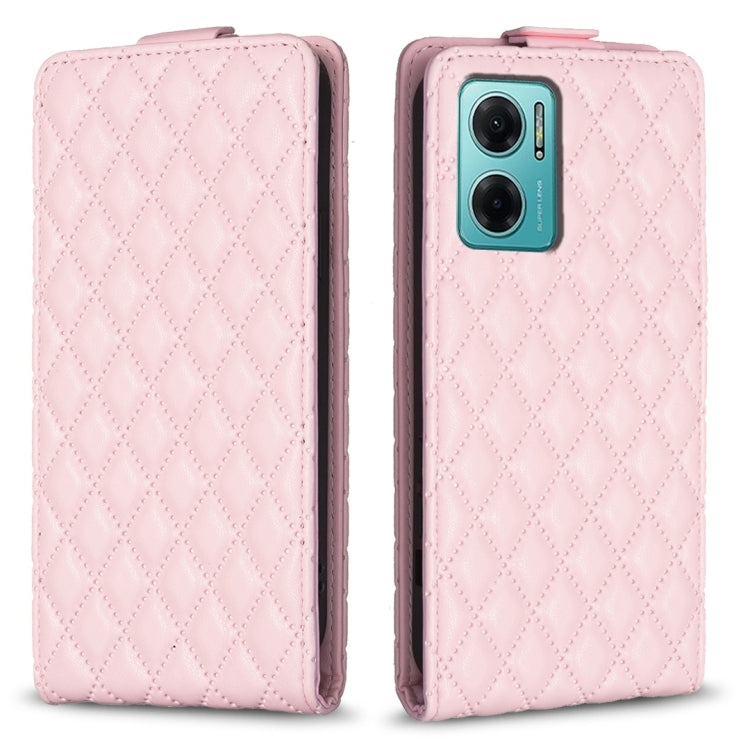 Light pink leather flip phone case with diamond lattice pattern and camera cutout