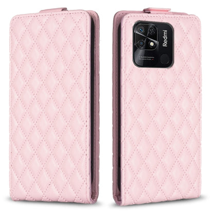Light pink leather flip phone case with diamond lattice texture and camera cutout