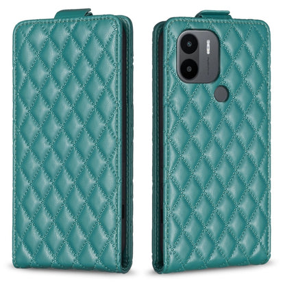 Teal green leather flip phone case with diamond lattice pattern and camera cutout