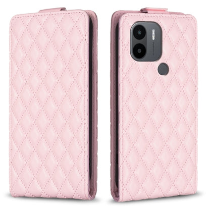 Pink leather flip phone case with diamond lattice texture and camera cutout