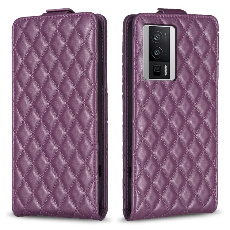 Purple leather flip phone case with diamond lattice texture and camera cutout
