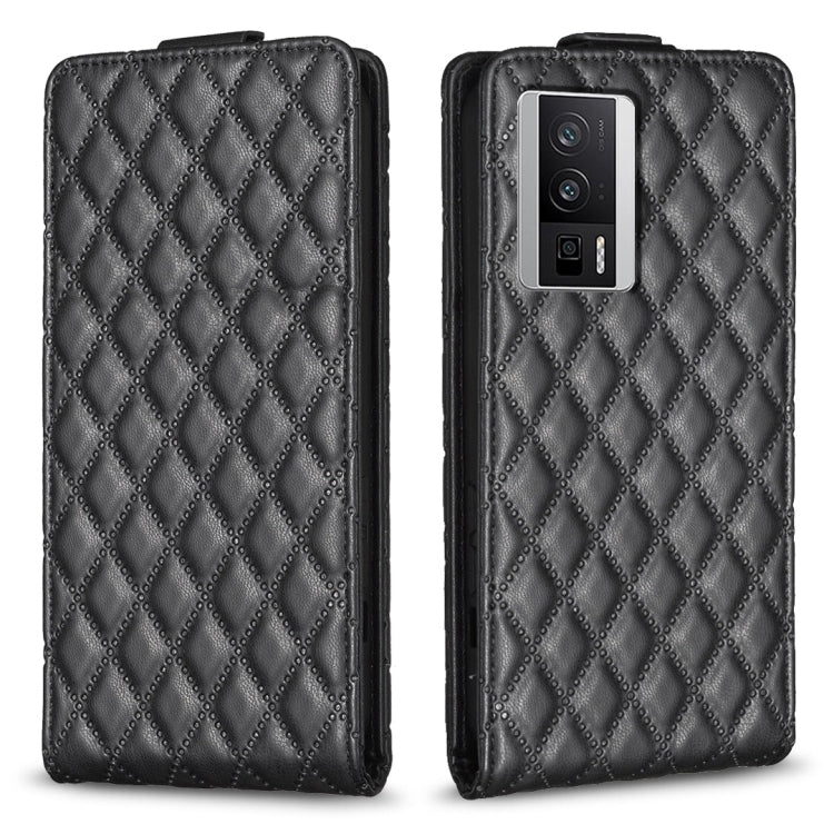 Black leather flip phone case with diamond lattice texture and camera cutout