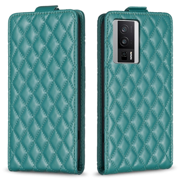 Teal leather flip phone case with diamond lattice texture and camera cutout