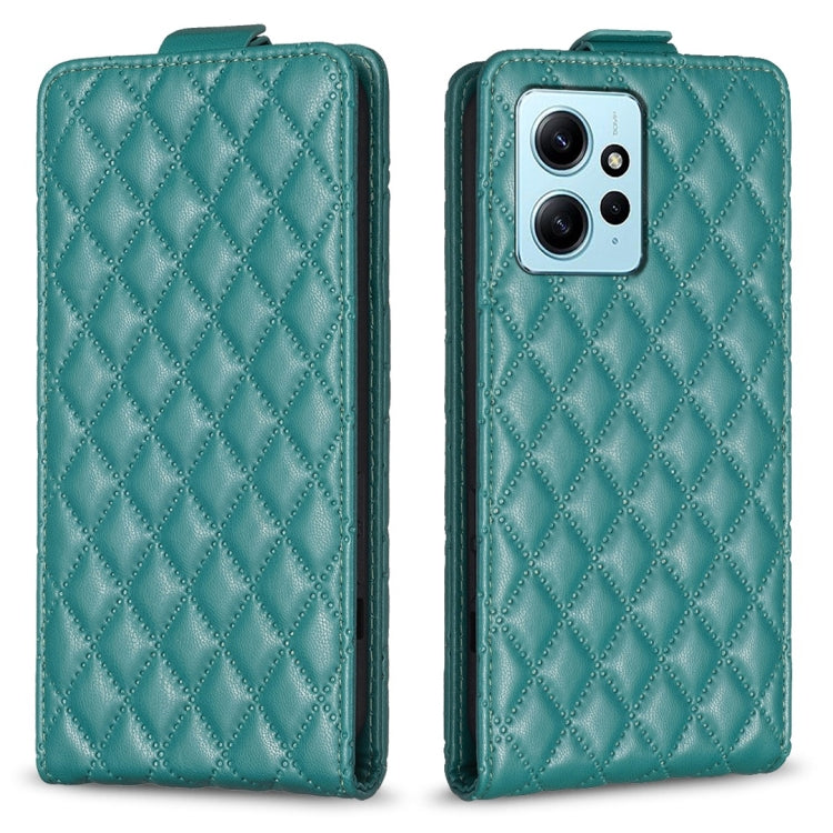 Teal leather flip phone case with diamond lattice pattern, front cover and phone camera view.