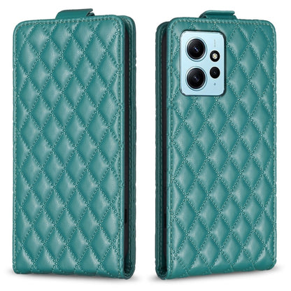 Teal leather flip phone case with diamond lattice pattern, front cover and phone camera view.