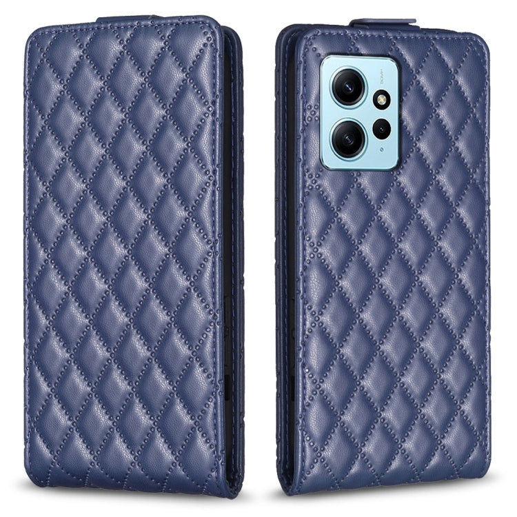 Blue leather flip phone case with diamond lattice pattern, front cover and phone camera view.