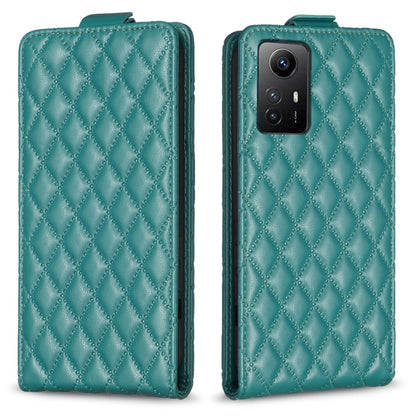 Teal leather flip phone case with diamond lattice pattern, front cover and camera cutout.