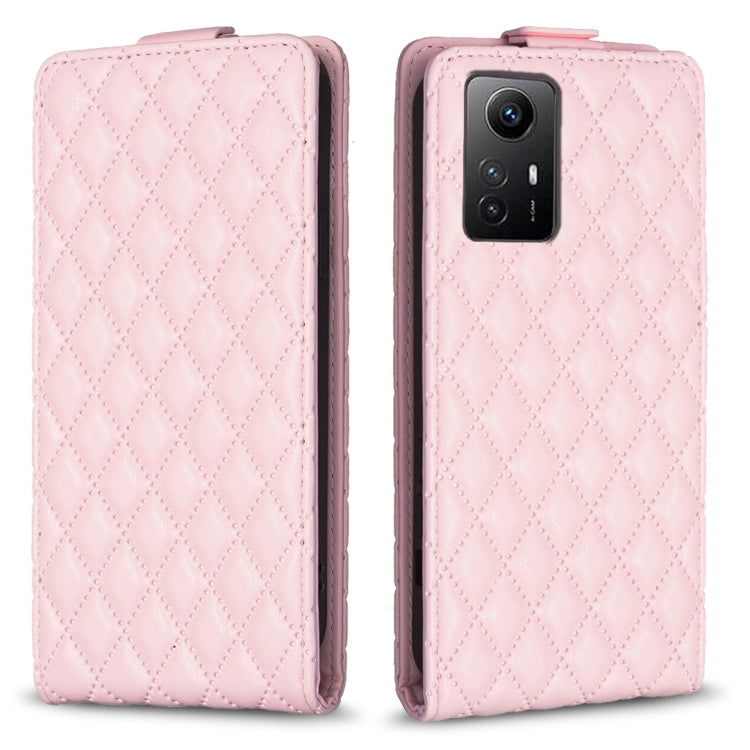 Pink leather flip phone case with diamond lattice pattern, front cover and camera cutout.