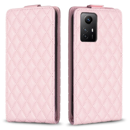 Pink leather flip phone case with diamond lattice pattern, front cover and camera cutout.