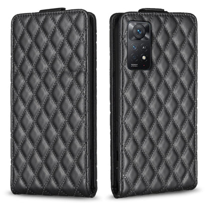 Black diamond-lattice leather flip phone case with camera cutout and stitched edge
