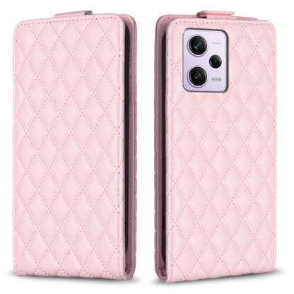 Diamond lattice vertical flip leather phone case in pink, with camera cutout