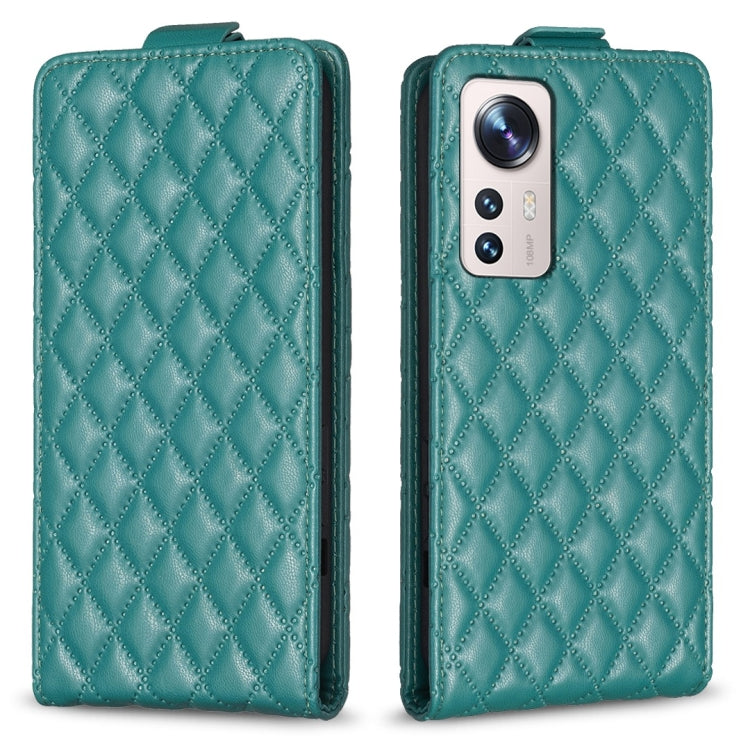 Teal diamond-lattice leather flip phone case with camera cutout and front flap