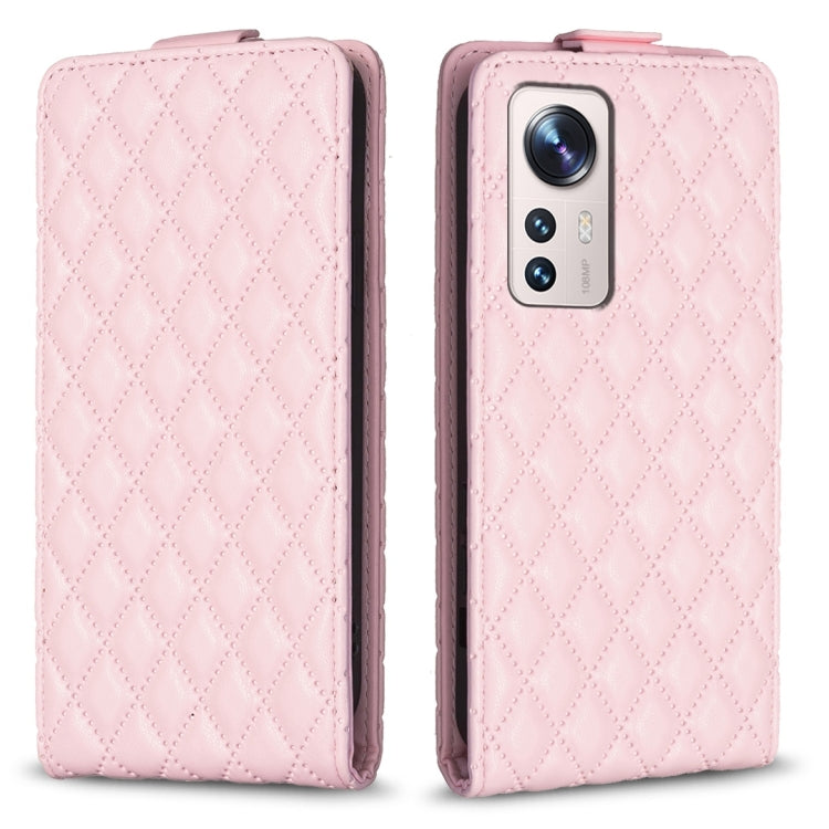 Light pink diamond-lattice leather flip phone case with camera cutout and front flap