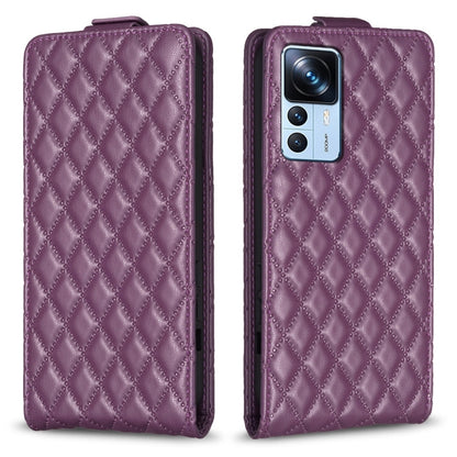 Dark purple diamond-lattice leather flip phone case with camera cutout and folio flap