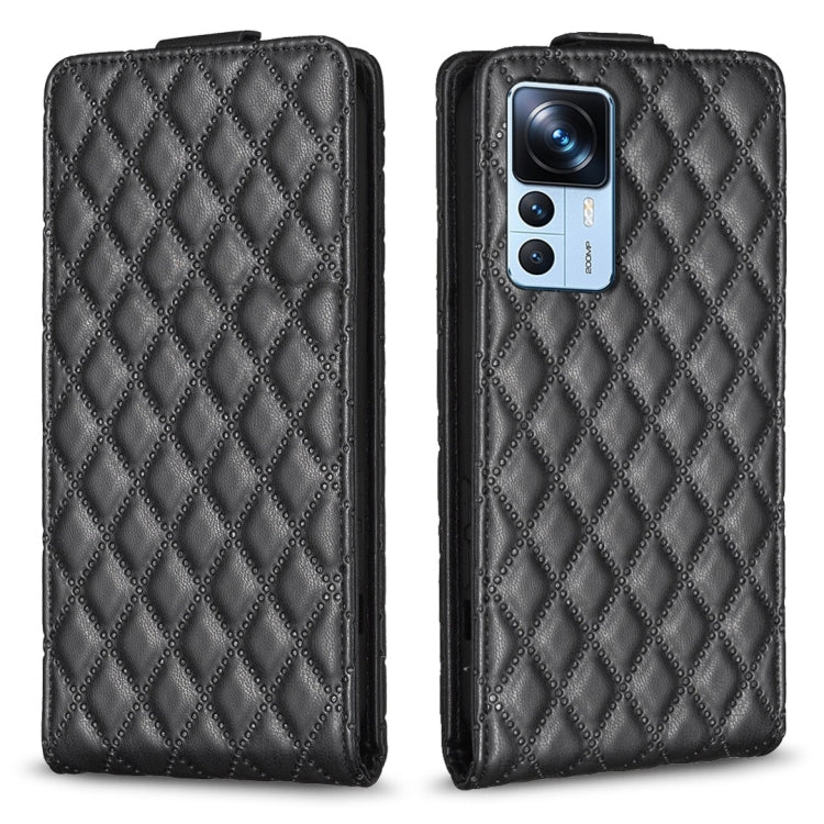 Black diamond-lattice leather flip phone case with camera cutout and folio flap