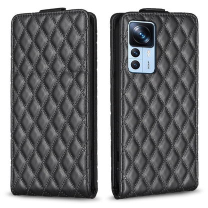 Black diamond-lattice leather flip phone case with camera cutout and folio flap