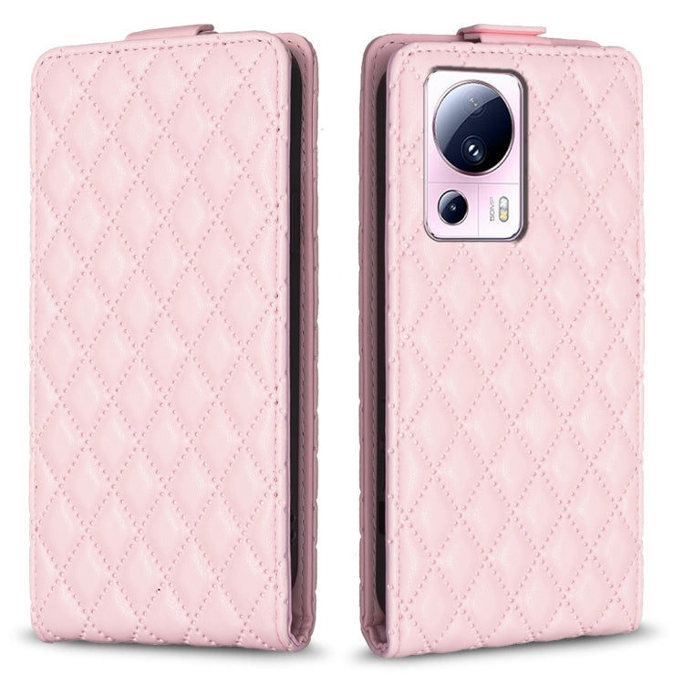 Pink leather flip phone case with diamond lattice texture and cutout for camera
