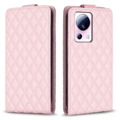 Pink leather flip phone case with diamond lattice texture and cutout for camera