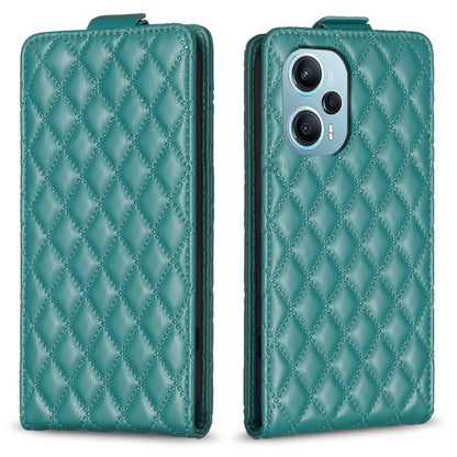 Teal leather flip phone case with diamond lattice pattern, camera cutouts