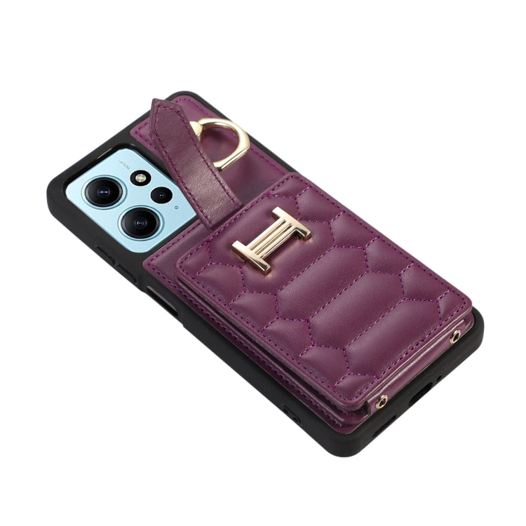Dark purple quilted phone case with card holder flap and ring grip detail