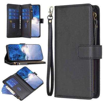 Black leather flip phone wallet with zipper closure, wrist strap, and card slots