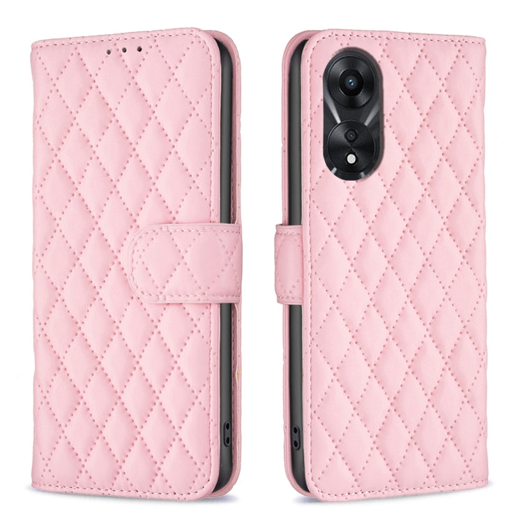 Pink diamond lattice leather flip phone case with dual camera cutout and magnetic strap