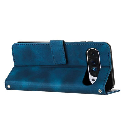 Blue leather phone case with kickstand-style flap and side lanyard loop