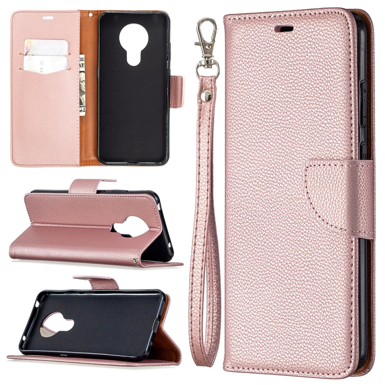Rose pink textured leather flip phone case with card slots and wrist lanyard strap