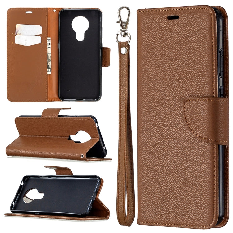 Brown textured leather flip phone case with card slots and wrist lanyard strap