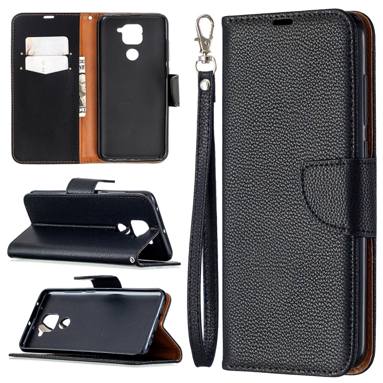 Black textured leather flip phone case with card slots and wrist lanyard strap