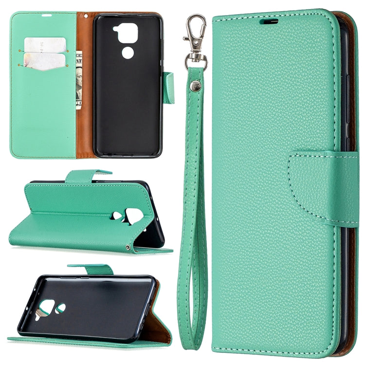 Mint green leather phone case with card slots, stand, and wrist lanyard strap