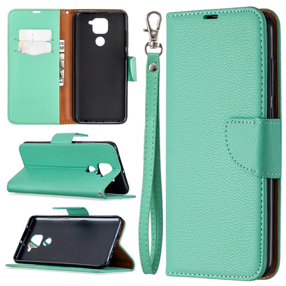 Mint green leather phone case with card slots, stand, and wrist lanyard strap