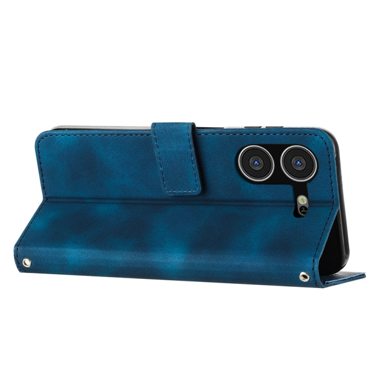 Blue leather-style folio phone case with camera cutouts and fold-over front cover.