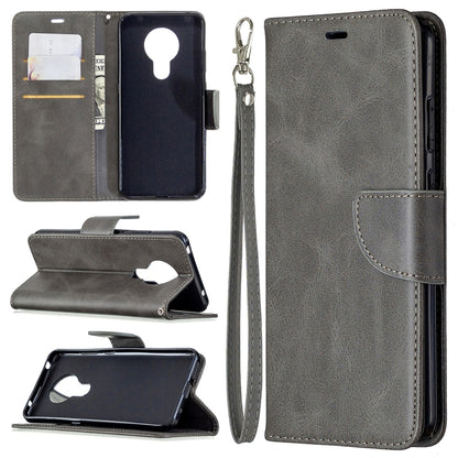 Grey flip wallet phone case with card slots and lanyard, PU leather texture, holder.