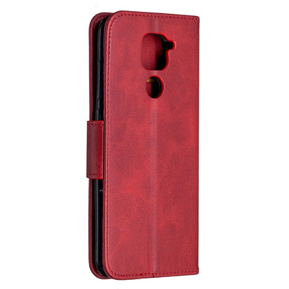 Red PU leather flip wallet phone case with cutout for camera and speaker, back view