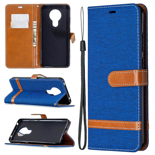 Blue denim flip phone wallet case with card slots, stand and lanyard strap