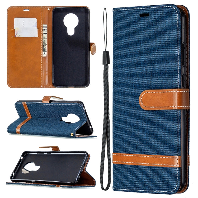 Blue denim flip phone wallet case with lanyard and card slots, open view