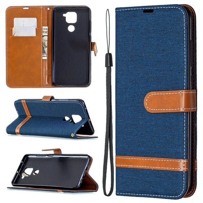 Denim-textured flip phone case with card slots and lanyard, deep blue with tan accents