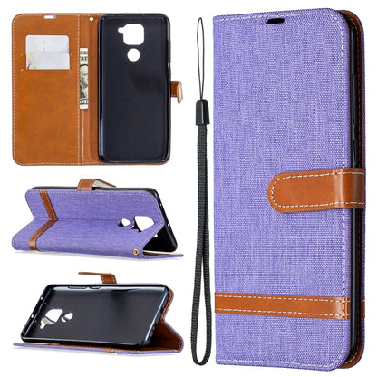 Denim-textured flip phone case with card slots and lanyard, lavender purple with tan accents