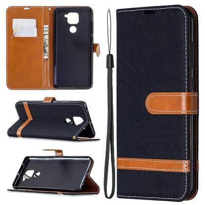 Denim-textured navy flip wallet phone case with card slots and lanyard strap, brown trim