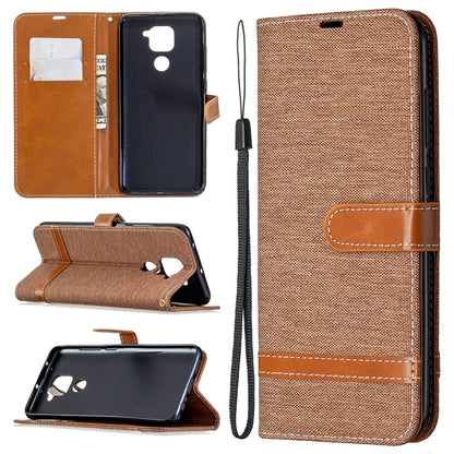 Denim-textured tan flip wallet phone case with card slots and lanyard strap, brown trim